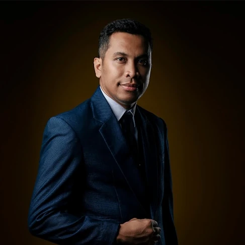 Professional portrait of Mr. David Chen, Director of Global Operations at American Earth Moving Inc., an AMML operational partner.